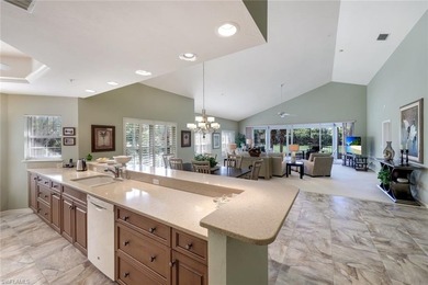 SPECTACULAR!! This beautiful End Unit, SOLD TURNKEY, overlooks on Bonita Bay West in Florida - for sale on GolfHomes.com, golf home, golf lot