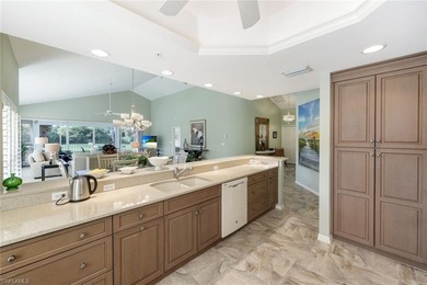 SPECTACULAR!! This beautiful End Unit, SOLD TURNKEY, overlooks on Bonita Bay West in Florida - for sale on GolfHomes.com, golf home, golf lot
