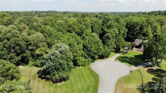Only minutes to Greensboro NC and former PGA tour host Forest on Forest Oaks Country Club in North Carolina - for sale on GolfHomes.com, golf home, golf lot