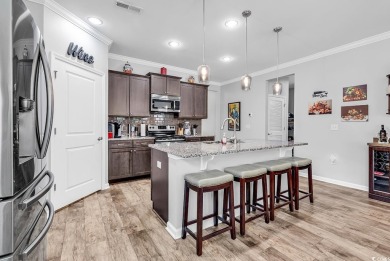 Easy Living in North Myrtle Beach!  Discover the perfect blend on Tidewater Golf Club and Plantation in South Carolina - for sale on GolfHomes.com, golf home, golf lot