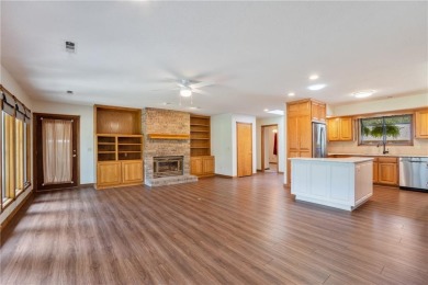 This beautifully updated home is on the 3rd green of a pristine on Holiday Island Golf Course in Arkansas - for sale on GolfHomes.com, golf home, golf lot