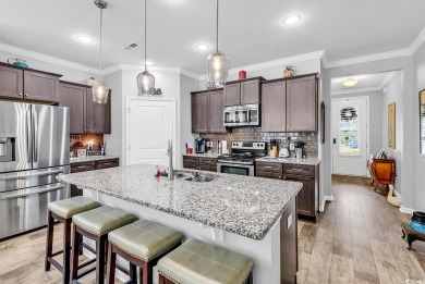 Easy Living in North Myrtle Beach!  Discover the perfect blend on Tidewater Golf Club and Plantation in South Carolina - for sale on GolfHomes.com, golf home, golf lot