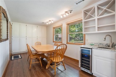 This beautifully updated home is on the 3rd green of a pristine on Holiday Island Golf Course in Arkansas - for sale on GolfHomes.com, golf home, golf lot