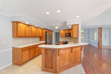 Welcome to easy coastal living in this beautifully maintained on Sea Trail Golf Resort in North Carolina - for sale on GolfHomes.com, golf home, golf lot