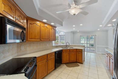 Welcome to easy coastal living in this beautifully maintained on Sea Trail Golf Resort in North Carolina - for sale on GolfHomes.com, golf home, golf lot