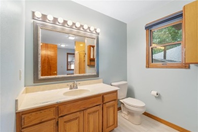 This beautifully updated home is on the 3rd green of a pristine on Holiday Island Golf Course in Arkansas - for sale on GolfHomes.com, golf home, golf lot