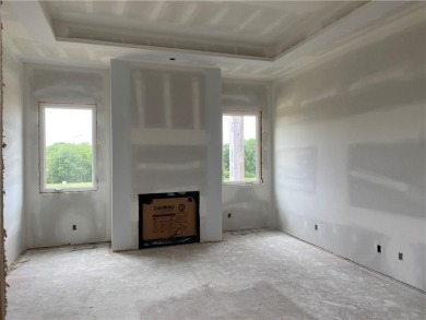 This spacious *Highland* 1.5 story by Don Julian Builders has on Staley Farms Golf Club in Missouri - for sale on GolfHomes.com, golf home, golf lot