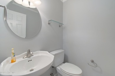 Welcome to easy coastal living in this beautifully maintained on Sea Trail Golf Resort in North Carolina - for sale on GolfHomes.com, golf home, golf lot