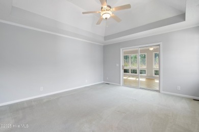 Welcome to easy coastal living in this beautifully maintained on Sea Trail Golf Resort in North Carolina - for sale on GolfHomes.com, golf home, golf lot
