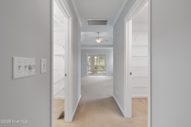 Welcome to easy coastal living in this beautifully maintained on Sea Trail Golf Resort in North Carolina - for sale on GolfHomes.com, golf home, golf lot
