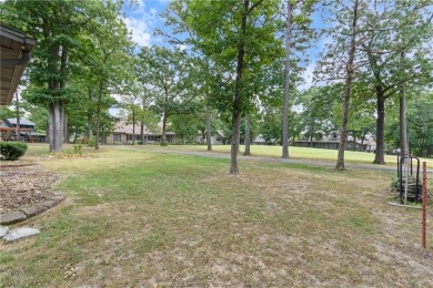 This beautifully updated home is on the 3rd green of a pristine on Holiday Island Golf Course in Arkansas - for sale on GolfHomes.com, golf home, golf lot