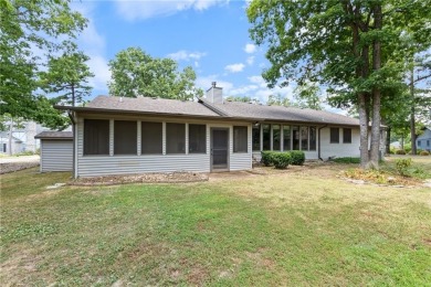 This beautifully updated home is on the 3rd green of a pristine on Holiday Island Golf Course in Arkansas - for sale on GolfHomes.com, golf home, golf lot
