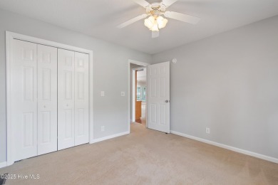 Welcome to easy coastal living in this beautifully maintained on Sea Trail Golf Resort in North Carolina - for sale on GolfHomes.com, golf home, golf lot