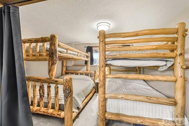 Turn-key fully furnished cabin on the Island Park Village Golf on  in ID - for sale on GolfHomes.com, golf home, golf lot