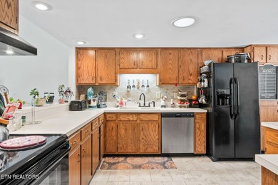 What a gem! Enjoy beautiful lake views and easy access for on Druid Hills Golf Club in Tennessee - for sale on GolfHomes.com, golf home, golf lot