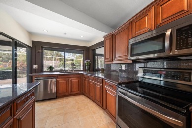 Welcome to this large ranch style, 4-bedroom, 2.5-bathroom home on Feather Sound Country Club in Florida - for sale on GolfHomes.com, golf home, golf lot