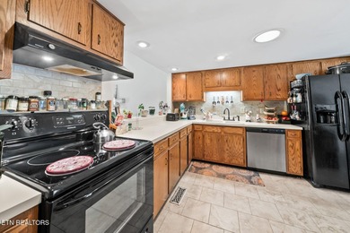 What a gem! Enjoy beautiful lake views and easy access for on Druid Hills Golf Club in Tennessee - for sale on GolfHomes.com, golf home, golf lot