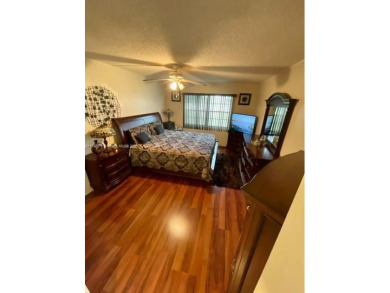 Must-see! This immaculate, move-in-ready unit is located in one on Flamingo Lakes Country Club in Florida - for sale on GolfHomes.com, golf home, golf lot