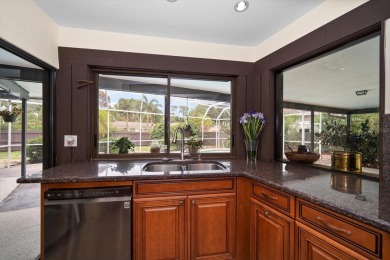Welcome to this large ranch style, 4-bedroom, 2.5-bathroom home on Feather Sound Country Club in Florida - for sale on GolfHomes.com, golf home, golf lot