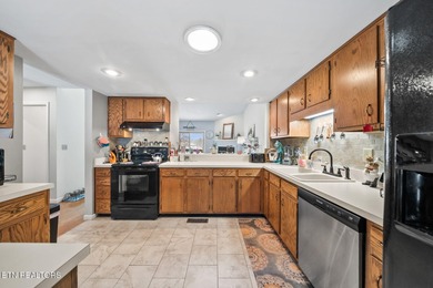 What a gem! Enjoy beautiful lake views and easy access for on Druid Hills Golf Club in Tennessee - for sale on GolfHomes.com, golf home, golf lot