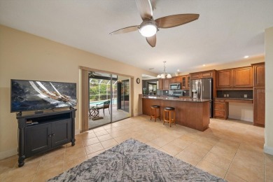 Welcome to this large ranch style, 4-bedroom, 2.5-bathroom home on Feather Sound Country Club in Florida - for sale on GolfHomes.com, golf home, golf lot