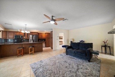 Welcome to this large ranch style, 4-bedroom, 2.5-bathroom home on Feather Sound Country Club in Florida - for sale on GolfHomes.com, golf home, golf lot