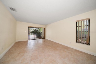 Welcome to this large ranch style, 4-bedroom, 2.5-bathroom home on Feather Sound Country Club in Florida - for sale on GolfHomes.com, golf home, golf lot