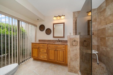 Welcome to this large ranch style, 4-bedroom, 2.5-bathroom home on Feather Sound Country Club in Florida - for sale on GolfHomes.com, golf home, golf lot