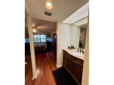 Must-see! This immaculate, move-in-ready unit is located in one on Flamingo Lakes Country Club in Florida - for sale on GolfHomes.com, golf home, golf lot