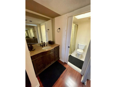 Must-see! This immaculate, move-in-ready unit is located in one on Flamingo Lakes Country Club in Florida - for sale on GolfHomes.com, golf home, golf lot