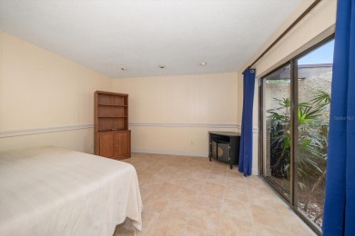 Welcome to this large ranch style, 4-bedroom, 2.5-bathroom home on Feather Sound Country Club in Florida - for sale on GolfHomes.com, golf home, golf lot