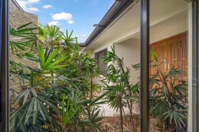 Welcome to this large ranch style, 4-bedroom, 2.5-bathroom home on Feather Sound Country Club in Florida - for sale on GolfHomes.com, golf home, golf lot
