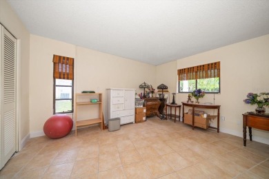 Welcome to this large ranch style, 4-bedroom, 2.5-bathroom home on Feather Sound Country Club in Florida - for sale on GolfHomes.com, golf home, golf lot