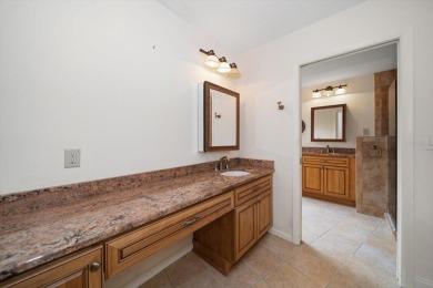 Welcome to this large ranch style, 4-bedroom, 2.5-bathroom home on Feather Sound Country Club in Florida - for sale on GolfHomes.com, golf home, golf lot