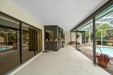 Welcome to this large ranch style, 4-bedroom, 2.5-bathroom home on Feather Sound Country Club in Florida - for sale on GolfHomes.com, golf home, golf lot
