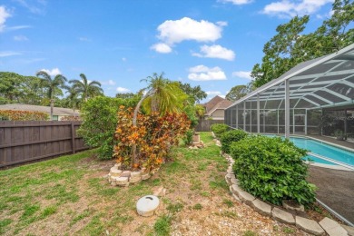 Welcome to this large ranch style, 4-bedroom, 2.5-bathroom home on Feather Sound Country Club in Florida - for sale on GolfHomes.com, golf home, golf lot
