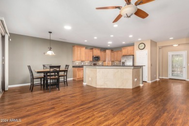 This beautiful Gala model home offers 2 bedrooms, 2 baths plus on Copper Canyon Golf Club in Arizona - for sale on GolfHomes.com, golf home, golf lot