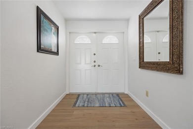 Updated golf course pool home with solar in gated Spanish Wells on Spanish Wells Golf and Country Club in Florida - for sale on GolfHomes.com, golf home, golf lot