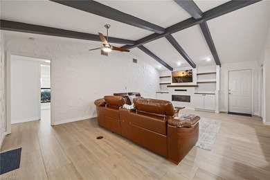 Updated golf course pool home with solar in gated Spanish Wells on Spanish Wells Golf and Country Club in Florida - for sale on GolfHomes.com, golf home, golf lot