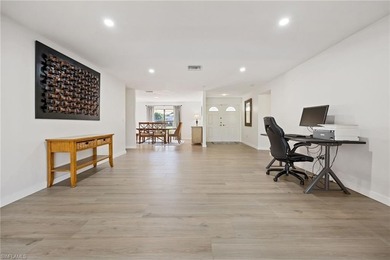 Updated golf course pool home with solar in gated Spanish Wells on Spanish Wells Golf and Country Club in Florida - for sale on GolfHomes.com, golf home, golf lot