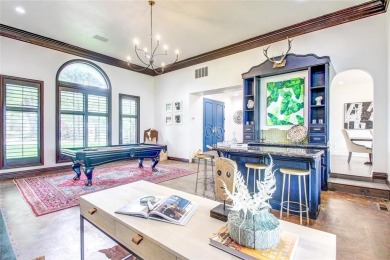 Welcome to a refined residence nestled on the prestigious west on Oak Tree National Golf and Country Club in Oklahoma - for sale on GolfHomes.com, golf home, golf lot