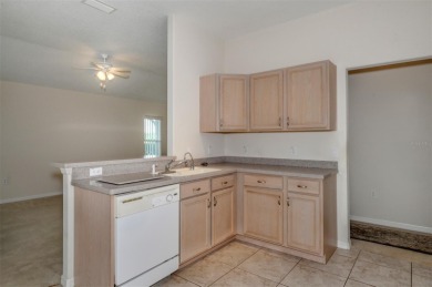 This well-maintained 2 bedroom/2 bathroom/den/2 car garage home on Twisted Oaks Golf Club in Florida - for sale on GolfHomes.com, golf home, golf lot