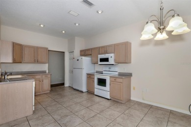 This well-maintained 2 bedroom/2 bathroom/den/2 car garage home on Twisted Oaks Golf Club in Florida - for sale on GolfHomes.com, golf home, golf lot