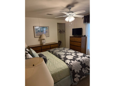 This lovely, manufactured home is on leased land in Lake on Pine Lakes Country Club in Florida - for sale on GolfHomes.com, golf home, golf lot