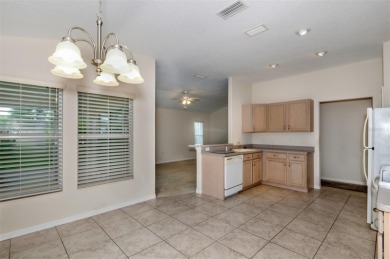 This well-maintained 2 bedroom/2 bathroom/den/2 car garage home on Twisted Oaks Golf Club in Florida - for sale on GolfHomes.com, golf home, golf lot