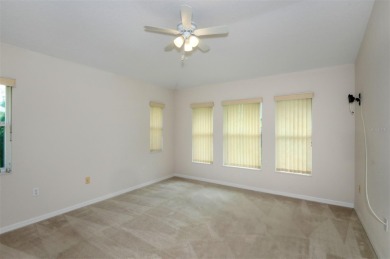 This well-maintained 2 bedroom/2 bathroom/den/2 car garage home on Twisted Oaks Golf Club in Florida - for sale on GolfHomes.com, golf home, golf lot