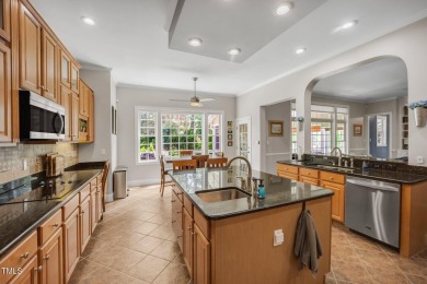 Discover timeless elegance in this immaculately maintained on TPC at Wakefield Plantation in North Carolina - for sale on GolfHomes.com, golf home, golf lot