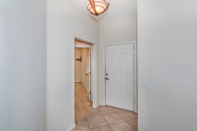 This well-maintained 2 bedroom/2 bathroom/den/2 car garage home on Twisted Oaks Golf Club in Florida - for sale on GolfHomes.com, golf home, golf lot