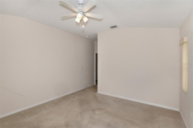 This well-maintained 2 bedroom/2 bathroom/den/2 car garage home on Twisted Oaks Golf Club in Florida - for sale on GolfHomes.com, golf home, golf lot