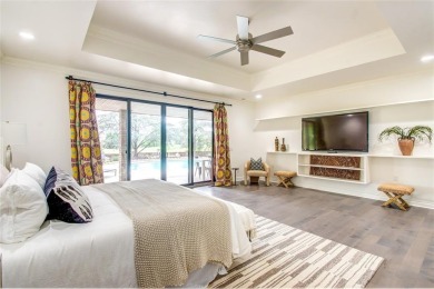 Welcome to a refined residence nestled on the prestigious west on Oak Tree National Golf and Country Club in Oklahoma - for sale on GolfHomes.com, golf home, golf lot